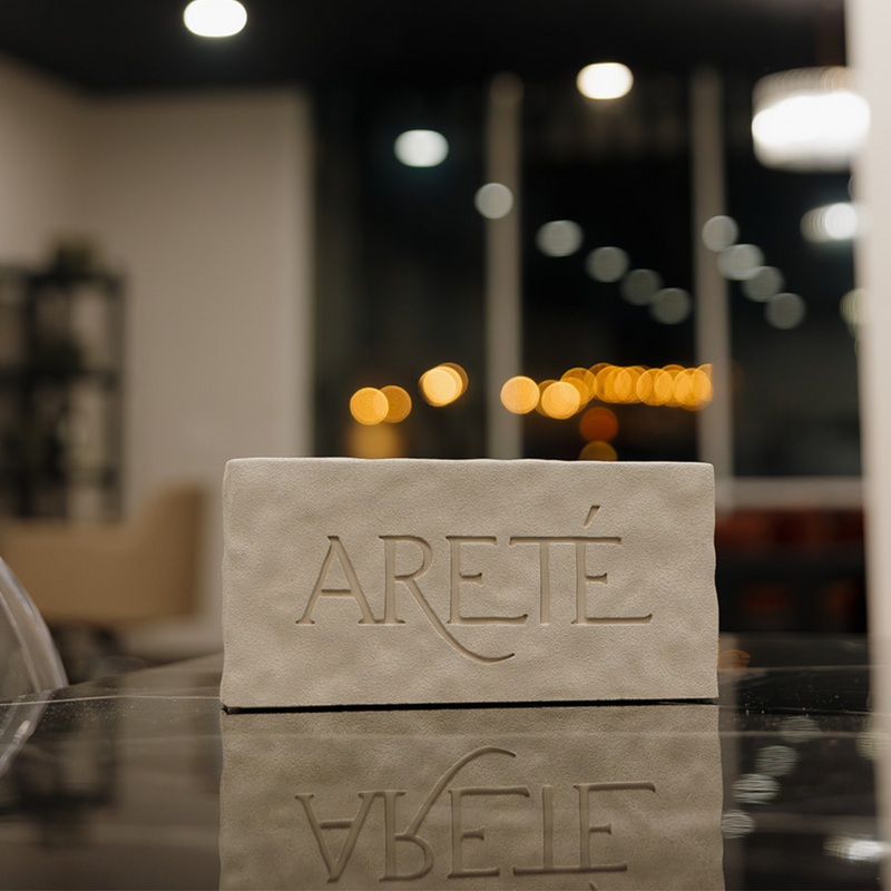 Areté Stone Tabletop Sign