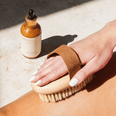 Ethereal Glow Shimmering Body Oil & Exfoliating Body Brush Duo